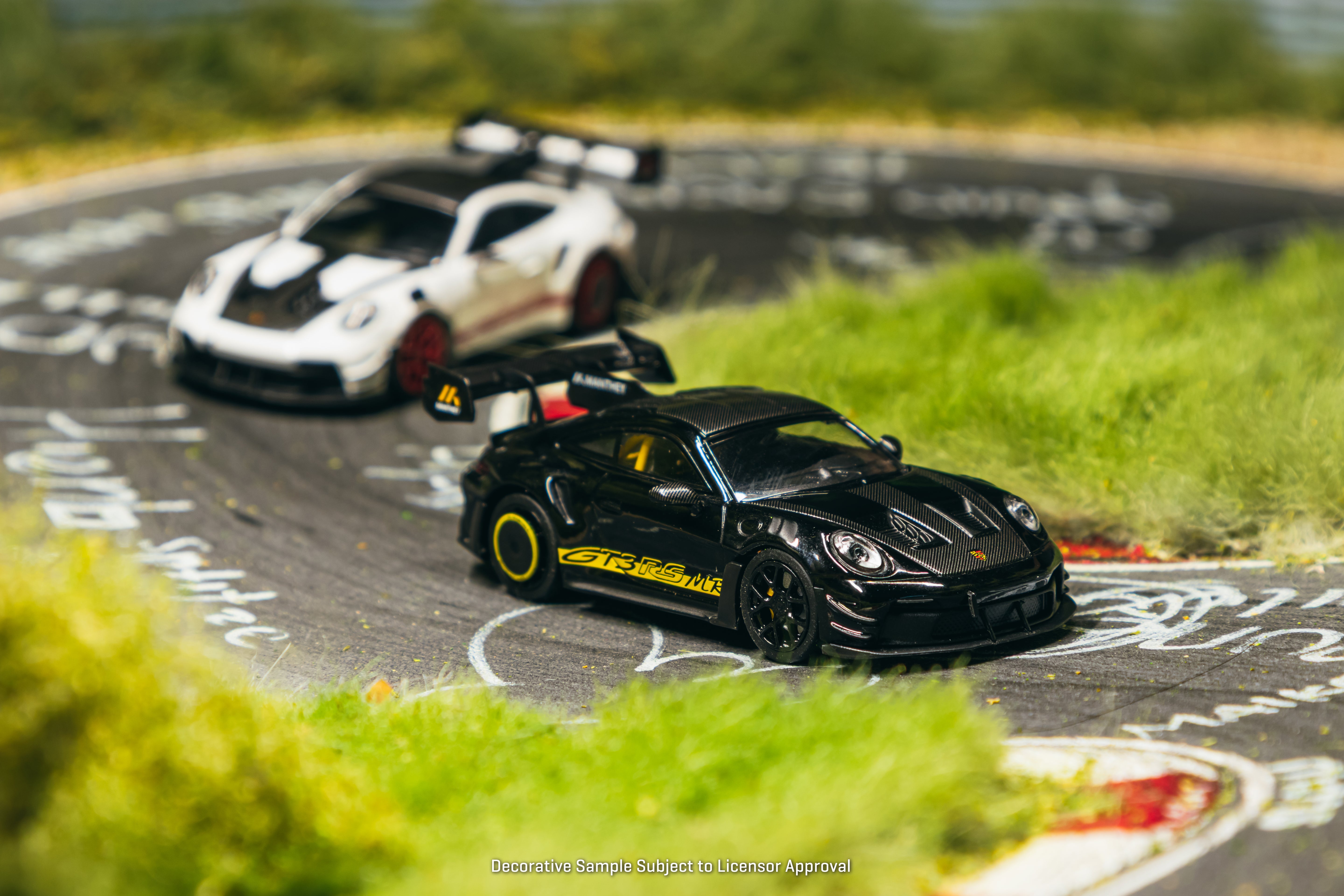 Tarmac Works Minichamps64 — Porsche 992.1 GT3 RS Manthey Racing (Black/Yellow)