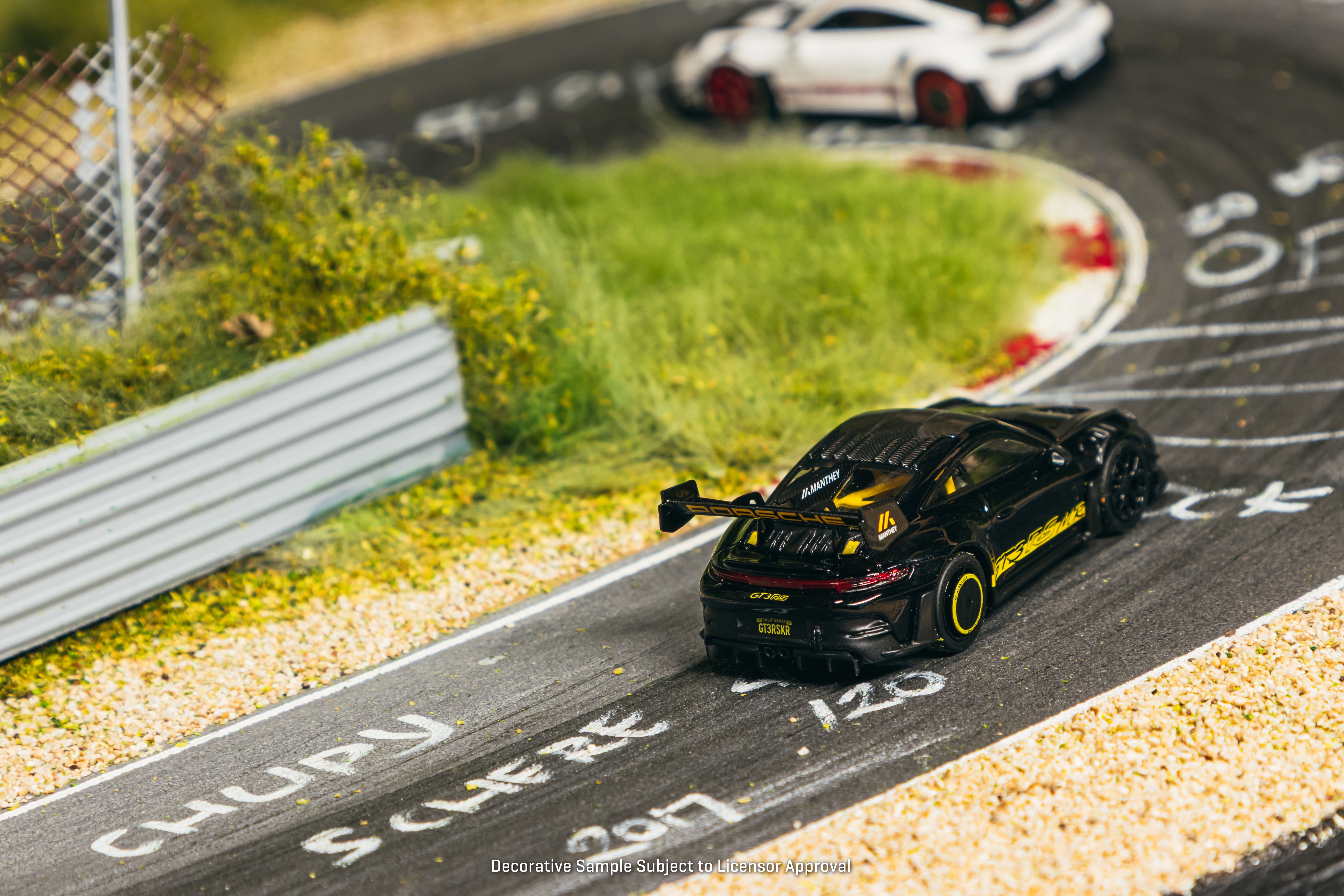 Tarmac Works Minichamps64 — Porsche 992.1 GT3 RS Manthey Racing (Black/Yellow)