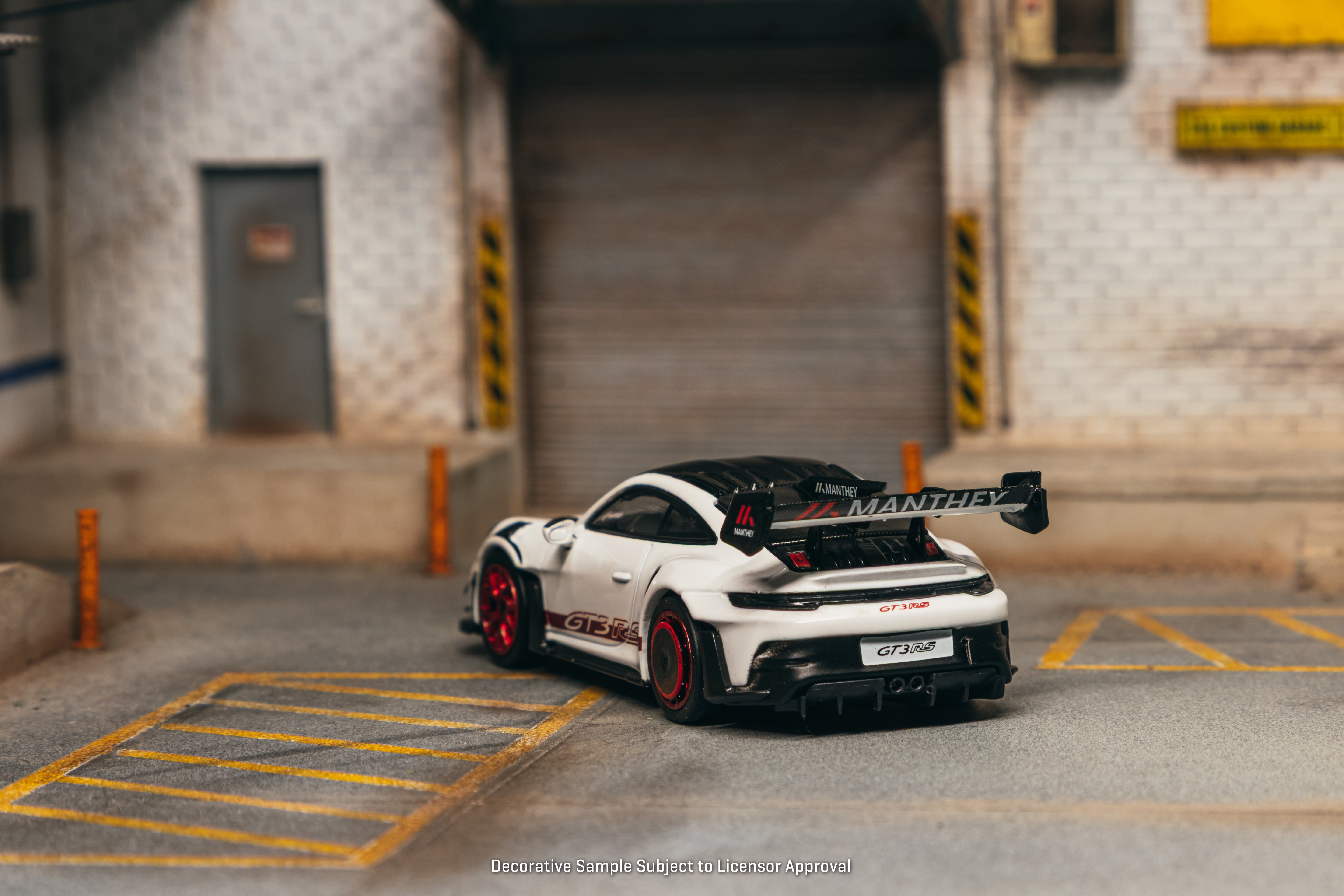 Tarmac Works Minichamps64 — Porsche 992.1 GT3 RS Manthey Racing (White/Red)